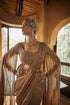 Beige gold tissue drape sari set with cape sleeve blouse and pre daped sari